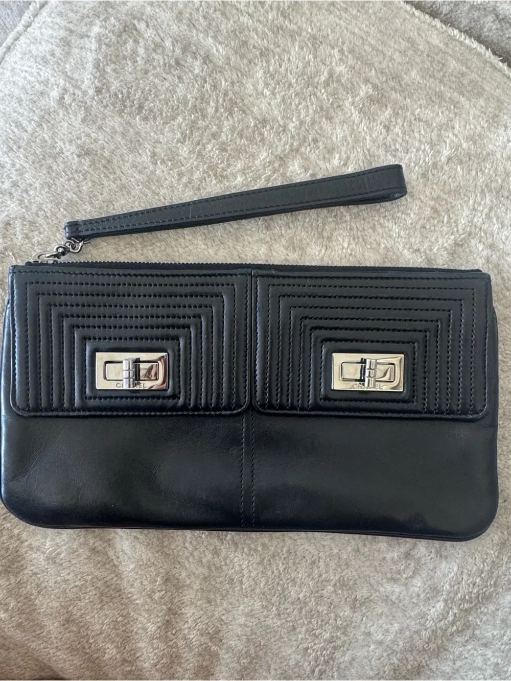 CHANEL Black Leather Wristlet Clutch with Quilted Flap and Silver Turn Locks
